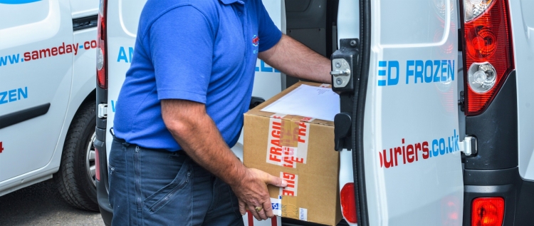 Need a Cost-Effective Yeovil Same Day Courier Service? Image of a goods being loaded into a courier van