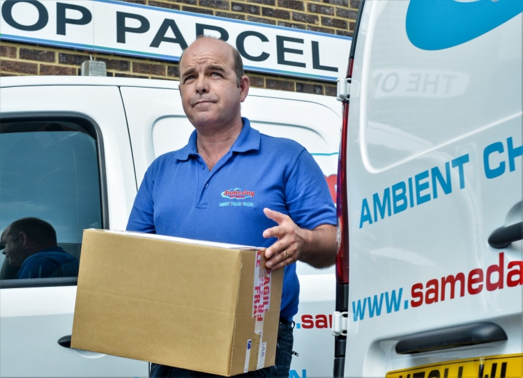 Safe & Secure Transport for Telecoms Equipment Image of Same Day Courier Collecting a Shipment