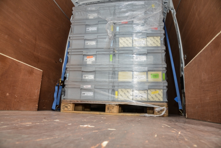 Image of a pallet of goods in a same day courier vehicle